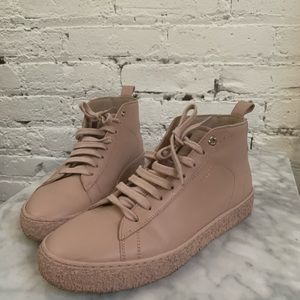 Axel Arigato high top leather court sneakers pink